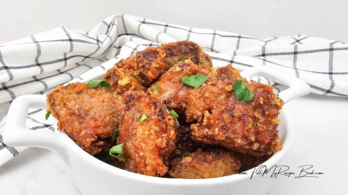 Homemade Fried Steak Nuggets Recipe. A crispy, golden snack or appetizer made with tender steak cubes coated in a cheese seasoned crust.