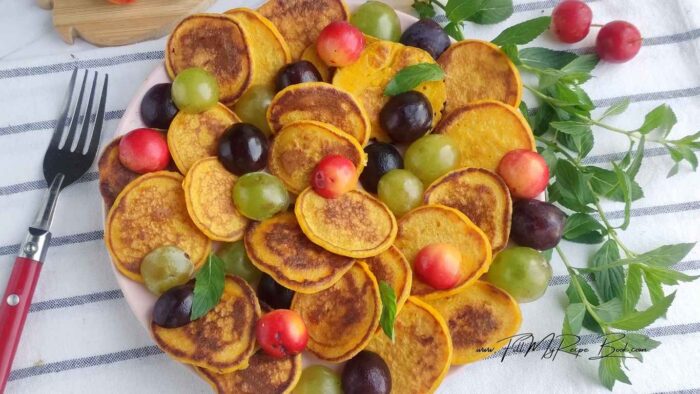 Transfer the pancakes to a serving plate. Serve warm with berries, honey or nuts.
