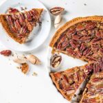 Bake the perfect homemade pecan pie recipe with a rich, gooey filling and crunchy pecans in a buttery crust. A classic, easy dessert for any occasion.