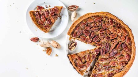 Bake the perfect homemade pecan pie recipe with a rich, gooey filling and crunchy pecans in a buttery crust. A classic, easy dessert for any occasion.