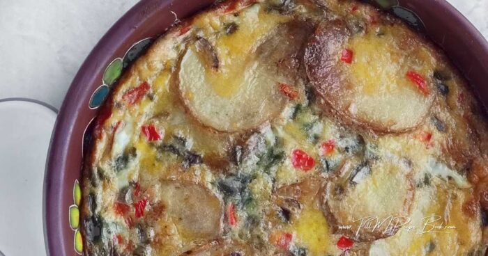  bake in the oven at 180 deg. C (356 deg. F) for about 20 minutes. 
The tortilla should be set and golden brown on top.