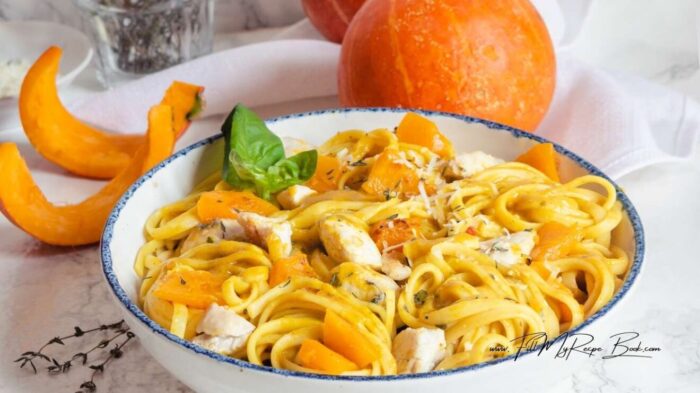 Cozy up with this creamy pumpkin pasta with chicken and tagliatelle in a rich pumpkin sauce. A perfect fall dinner full of comfort and flavor.