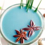 Warming Blue Moon Milk with butterfly pea flowers and spices. A soothing, caffeine free bedtime drink for restful sleep, with soothing honey.