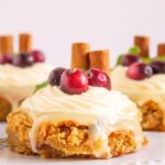 Bake these soft Cranberry Blondies with White Chocolate for a festive treat! A sweet, buttery dessert with cream cheese frosting.