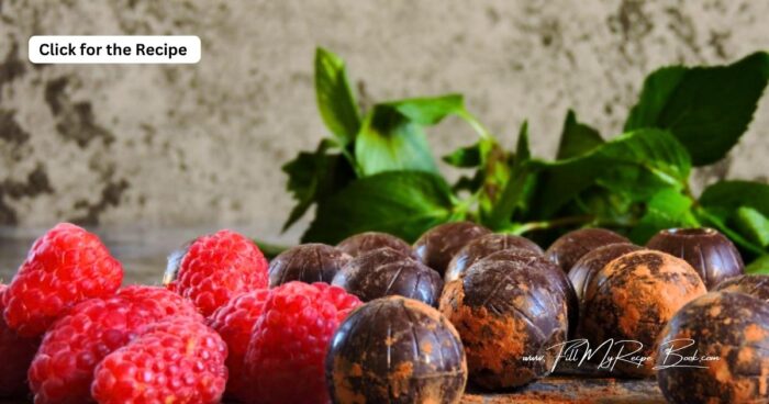 Raspberry Dark Chocolate Truffles. A no bake recipe to easily make with freeze dried and powdered raspberries, dark chocolate rolled in cocoa.