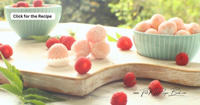Raspberry White Chocolate Truffle balls recipe rolled in castor sugar. An easy no bake pink Candy dessert to serve for snacks or gifts.