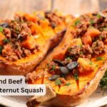 Enjoy this easy Ground Beef Stuffed Butternut Squash recipe. A cozy, flavorful dinner filled with seasoned beef, and veggies.