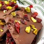 Make this Irresistible Cranberry Pistachio Bark. A quick and festive holiday treat with chocolate, tart cranberries, and crunchy pistachios.