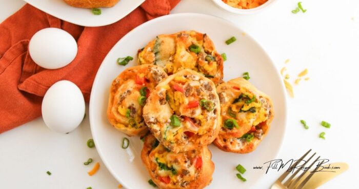 For the full recipe, see it attached.
Preheat the oven to 200 deg. C (400 deg. F) and line 1 large or 2 medium baking sheets with parchment paper. (or use muffin pan)
Slice each roll into ½–1-inch pinwheels, cleaning the knife between cuts. Arrange on the baking sheets about 3 inches apart.
Lightly brush the sides of each pinwheel with oil and bake for 15–18 minutes, or until golden brown and crisp.