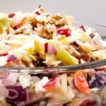 This crisp apple cranberry coleslaw recipe is fresh, crunchy, and lightly sweet. A quick and easy side dish perfect for holidays, and BBQs.