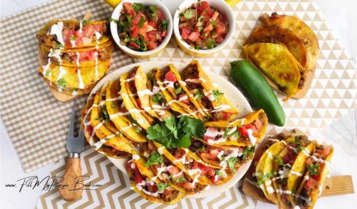 Add to the mini tacos just before serving. Transfer to a plate, spread a layer of sour cream over them, and serve with fresh salsa.