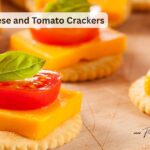 These simple cheese and tomato crackers are a quick, easy appetizer made with basic fridge ingredients. Perfect for the holidays, and last-minute entertaining.