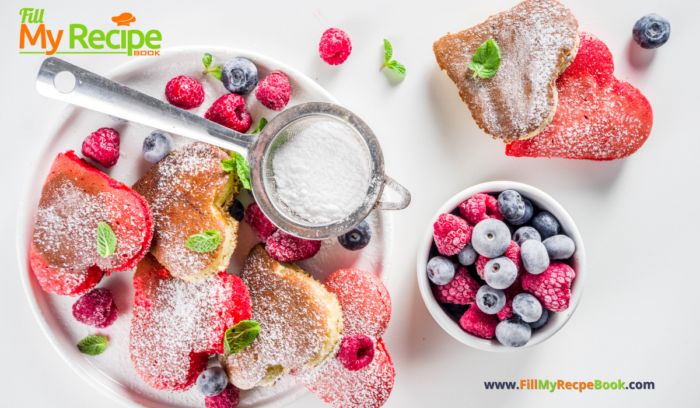 Mini Heart Pancakes with Berries recipe idea. An easy special breakfast to cook are heart shaped pancakes with raspberries and blueberries. Serve on a tray with flowers and a special card or note.