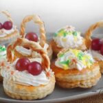 Quick and Easy Easter Baskets with puff pastry, cream cheese filling, fresh berries, and chocolate. A simple yet impressive Easter dessert.