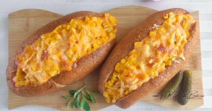Fill the buns with the cheese-corn mixture and top with grated cheese. Grill or bake until charred.