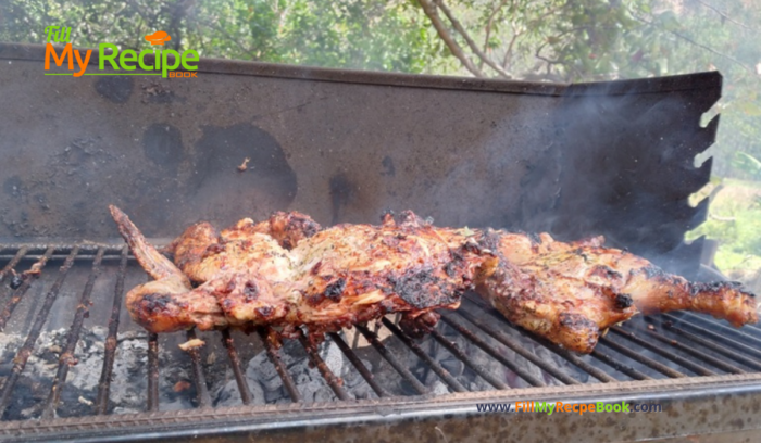 Grilled on outside braai or barbecue this recipe of a spatchcock chicken seasoned with fresh lemon juice.