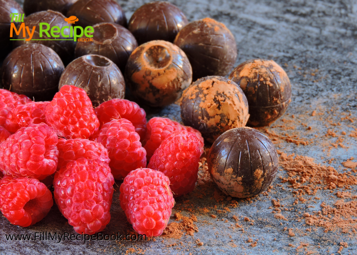 Raspberry Dark Chocolate Truffles. A no bake recipe to easily make with freeze dried and powdered raspberries, dark chocolate rolled in cocoa.
