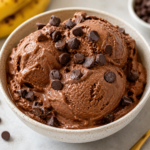 Creamy no added sugar chocolate banana ice cream made with frozen bananas, cocoa, and simple ingredients for an easy, healthier frozen treat.