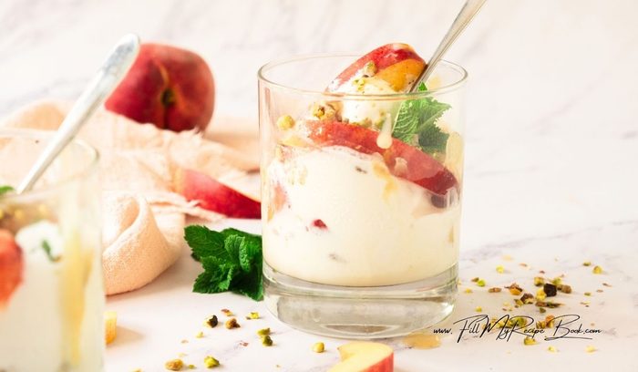 Easy caramelized grilled peaches and ice cream topped with homemade caramel. A fresh peach dessert that’s sweet, and perfect for a dessert.