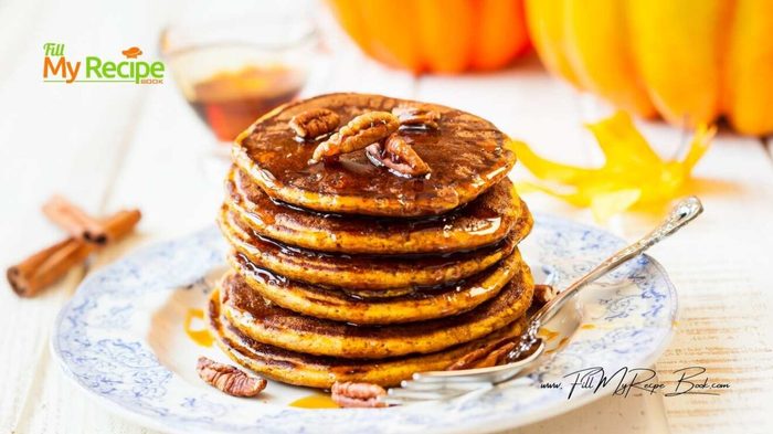 Easy homemade Fluffy Pumpkin Pancakes with pecan nuts and caramel sauce, a cozy breakfast recipe for fall mornings or seasonal treats.